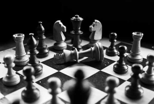 chess game in black and white, the king has fallen