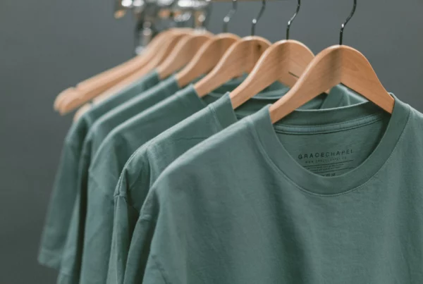 green shirts on hangers